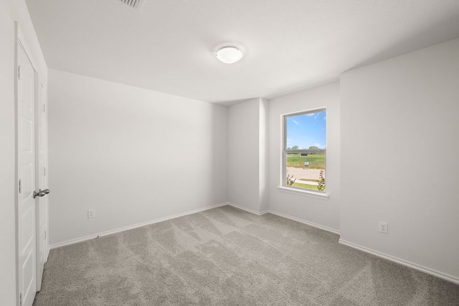 Representative exterior photo of a completed home built from the Cheyenne by Impression Homes in Baker Farms, Cleburne, TX (Image 18).