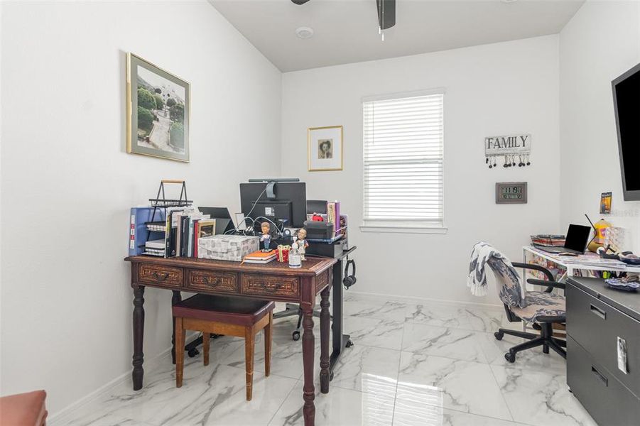 Furnished interior view inside a new home in Tohoqua Reserve, Kissimmee (Image 13).