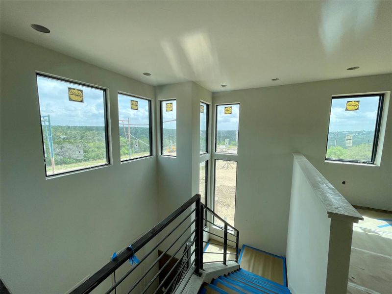 Interior space featuring abundant windows providing natural light and scenic views