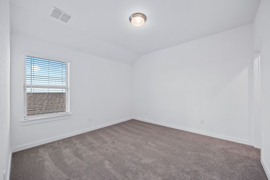 Bedoom in the Mesquite home plan by Trophy Signature Homes – REPRESENTATIVE PHOTO Bedoom in the Mesquite home plan by Trophy Signature Homes – REPRESENTATIVE PHOTO