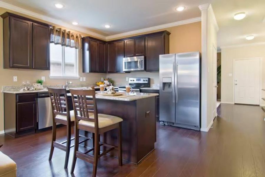 Photo of Centex model home with same floor plan, not of actual home listed.