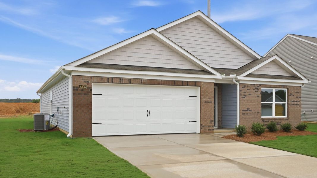 Front exterior of a new home in Bynum Farms, Farmville, NC, highlighting curb appeal (Image 26).