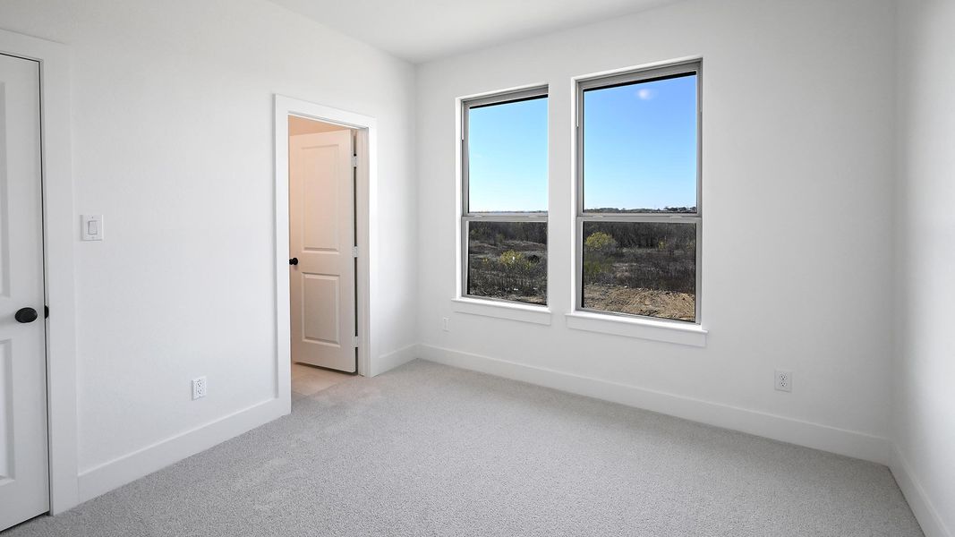 Spacious, unfurnished interior of a new home in Crosswinds 50', Kyle (Image 19).