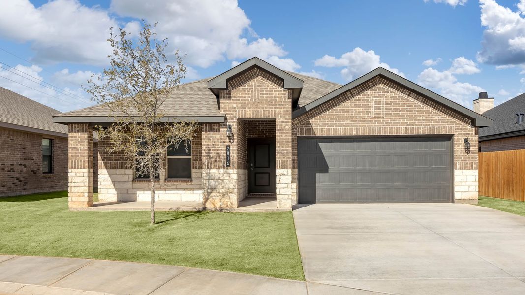 Front exterior of a new home in Everest Heights, Lubbock, TX, highlighting curb appeal (Image 1). Front exterior of a new home in Everest Heights, Lubbock, TX, highlighting curb appeal (Image 1).