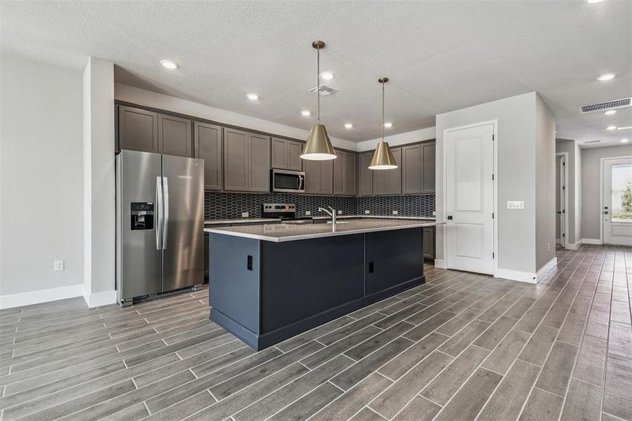 Furnished interior view inside a new home in The Peninsula at Rhodine Lake, Riverview (Image 8). Furnished interior view inside a new home in The Peninsula at Rhodine Lake, Riverview (Image 8).