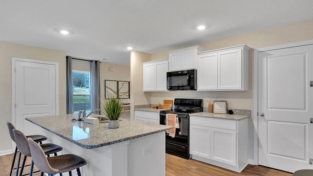 Furnished interior view inside a new home in The Hideaway at Fox Meadows, Bluff City (Image 12).
