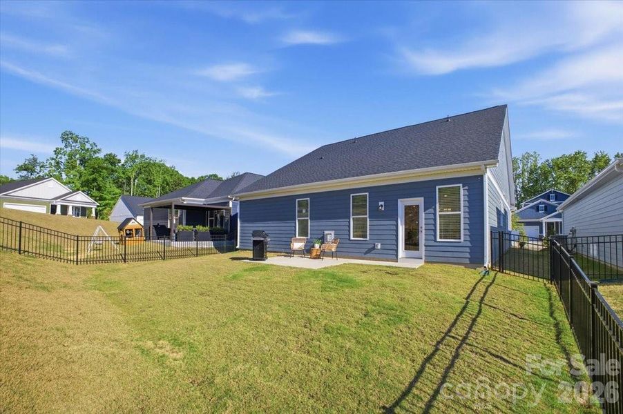 Exterior details and patio area of a home in The Terraces at Cramerton Mills, Cramerton (Image 21).