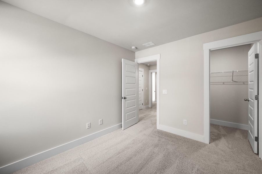 Photo is of a similar home