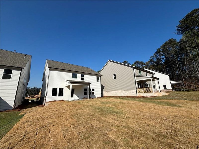 Exterior details and patio area of a home in Arbors at Richland Creek, Buford (Image 4).