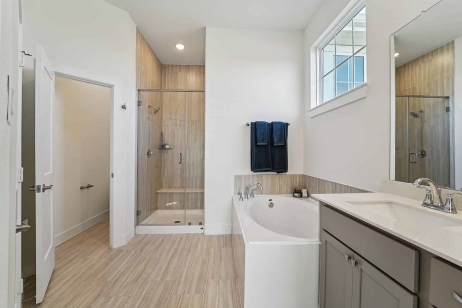 Furnished interior view inside a new home in Bridgeland, Cypress (Image 30).