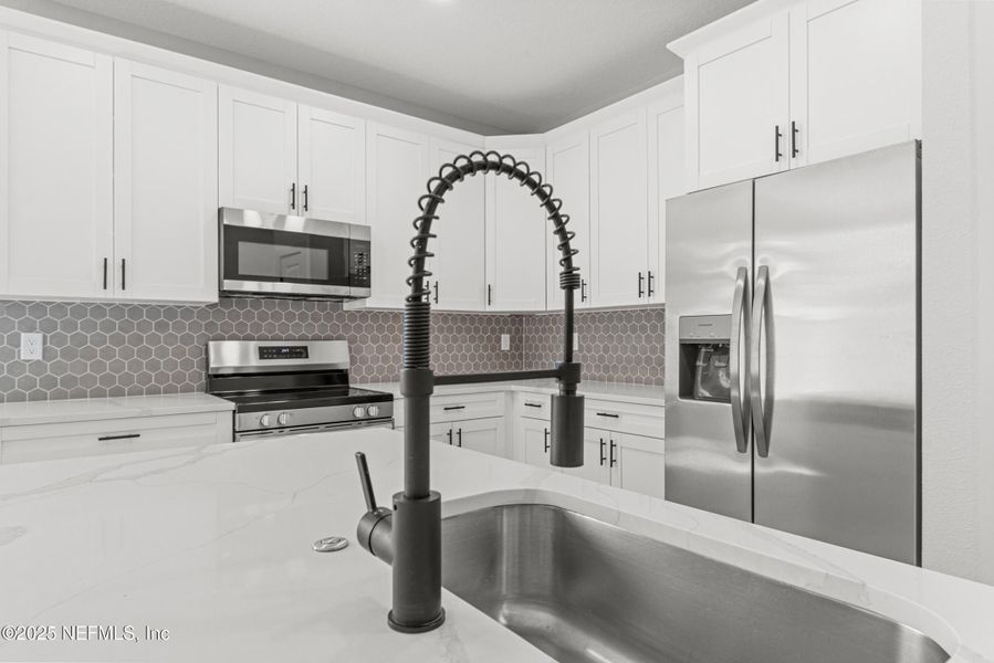 Furnished interior view inside a new home in , Jacksonville (Image 12).