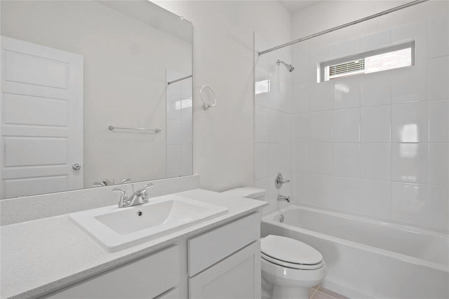 Bathroom in the Pecan II home plan by Trophy Signature Homes – REPRESENTATIVE PHOTO Bathroom in the Pecan II home plan by Trophy Signature Homes – REPRESENTATIVE PHOTO