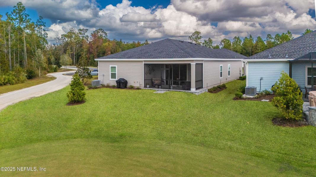 Exterior details and patio area of a home in Stillwater | Active Adult 55+: Stillwater (50s) - Royal Collection, St. Johns (Image 3). Exterior details and patio area of a home in Stillwater | Active Adult 55+: Stillwater (50s) - Royal Collection, St. Johns (Image 3).