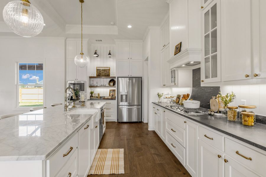 Representative furnished interior of a home built from the The Grayson by Reece Homes in Stella Ranch, Bryan (Image 23).