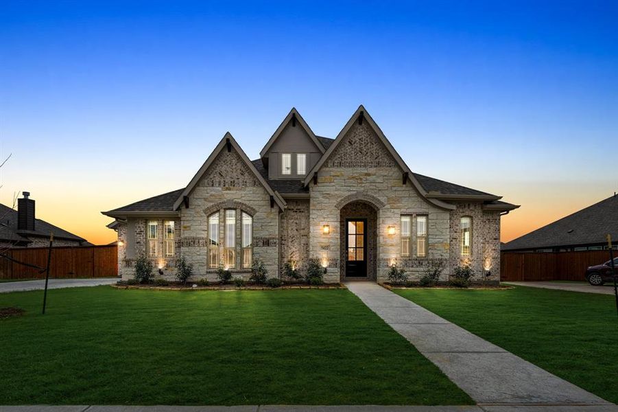 Front exterior of a new home in Hayes Crossing, Midlothian, TX, highlighting curb appeal (Image 2).