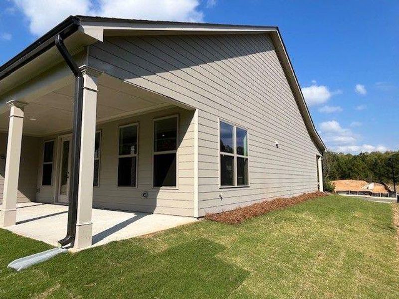 Exterior details and patio area of a home in Soleil Belmont Park, Canton (Image 3). Exterior details and patio area of a home in Soleil Belmont Park, Canton (Image 3).