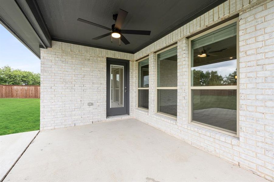 Exterior details and patio area of a home in Waterscape, Royse City (Image 27).