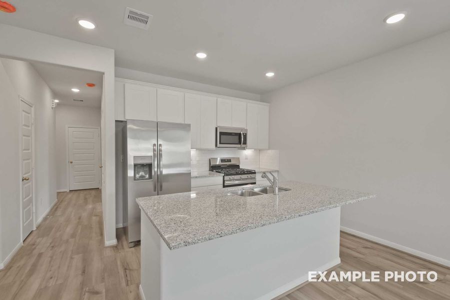 Representative furnished interior of a home built from the The Comal F by Davidson Homes LLC in Spring Branch Crossing, Conroe (Image 6).