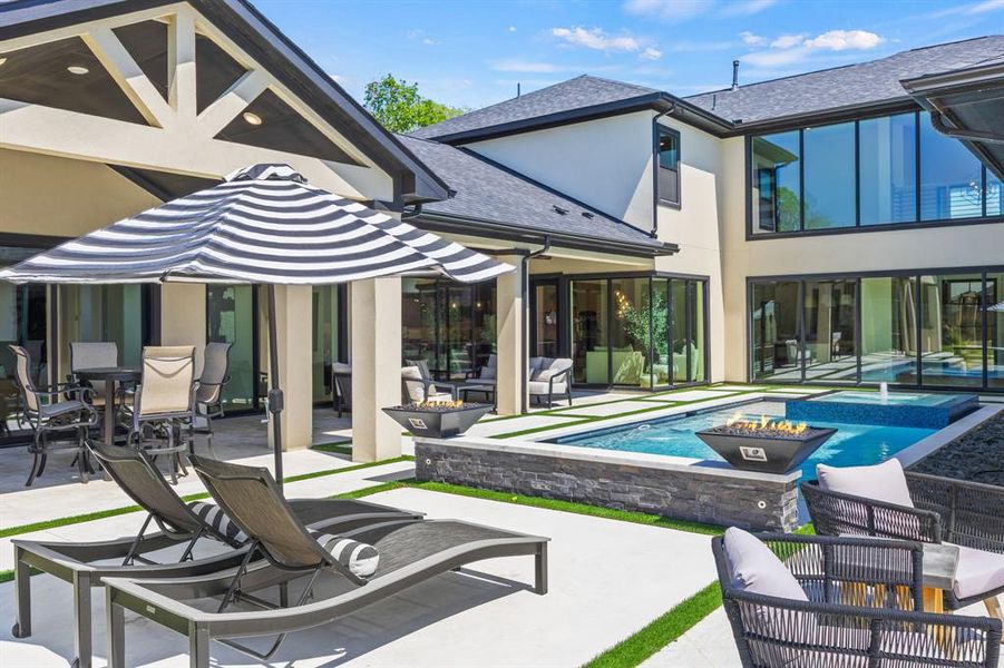 Multiple covered patios surround the pool! Multiple covered patios surround the pool!