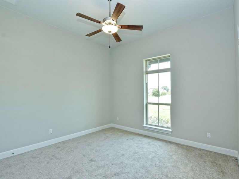 Representative unfurnished interior of a home built from the Madera II by Giddens Homes in Scofield Farms Estates, Georgetown (Image 330).