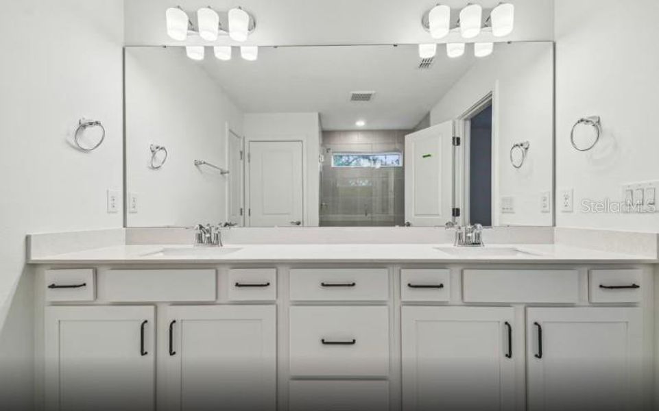 Furnished interior view inside a new home in Grandura, Sarasota (Image 10).