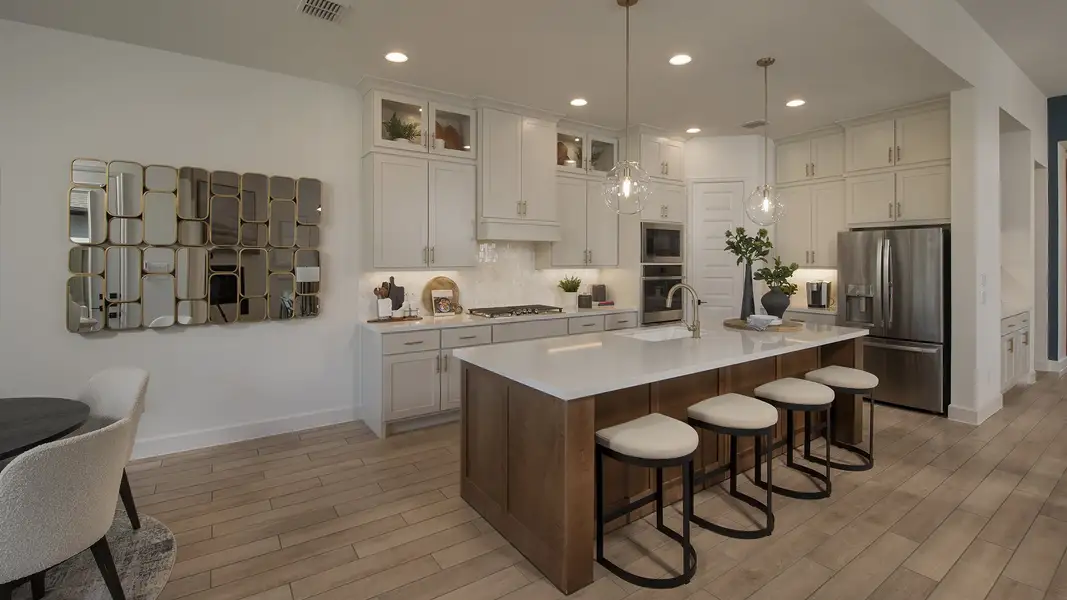 Representative furnished interior of a home built from the 3094W by Perry Homes in Santa Rita Ranch - Eldorado, Liberty Hill (Image 7). Representative furnished interior of a home built from the 3094W by Perry Homes in Santa Rita Ranch - Eldorado, Liberty Hill (Image 7).
