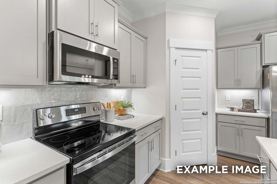 Furnished interior view inside a new home in Hickory Ridge, Elmendorf (Image 24).