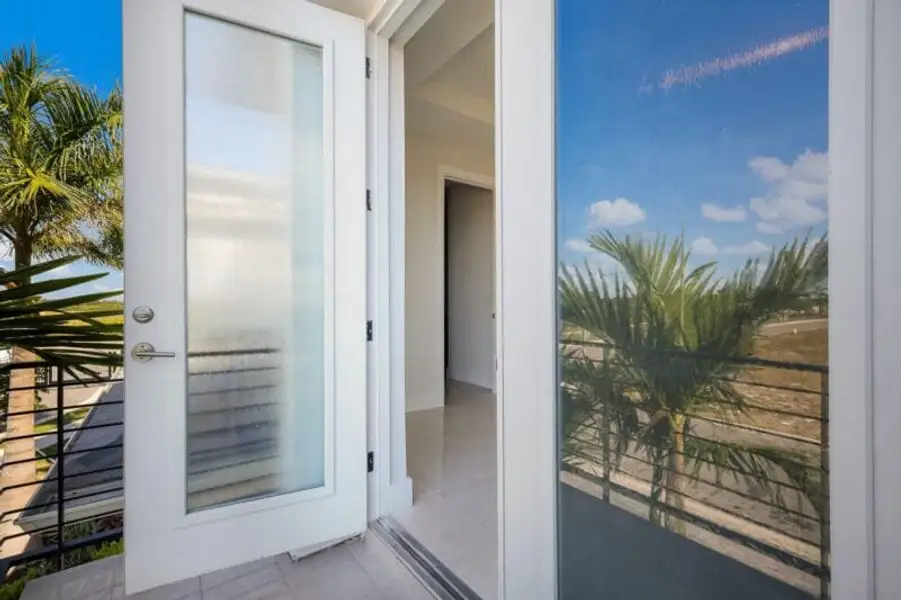Exterior details and patio area of a home in Aqua, Bradenton (Image 2).
