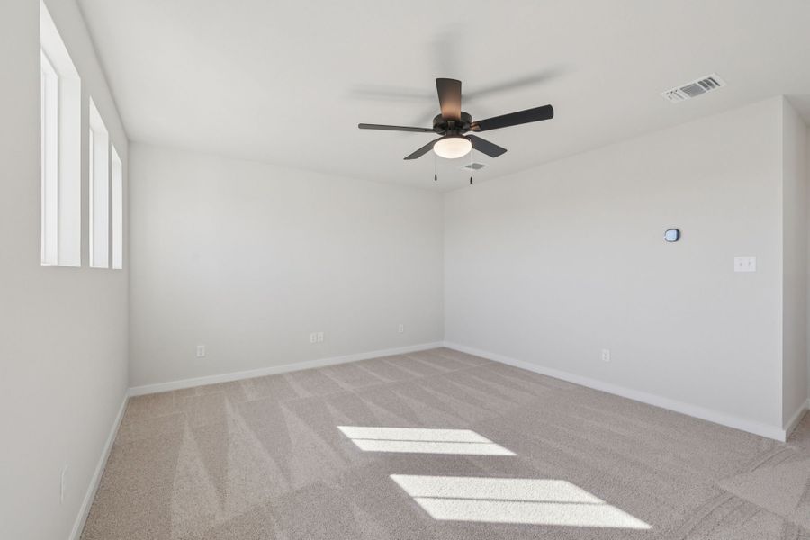 A ceiling fan in a room.