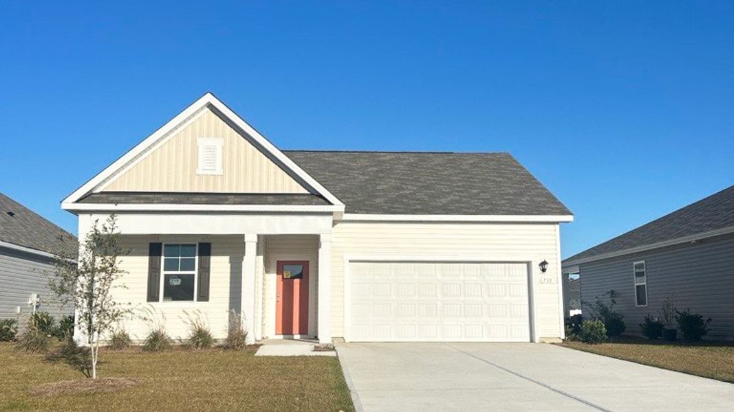 Front exterior of a new home in Stanbury Creek, Supply, NC, highlighting curb appeal (Image 1).