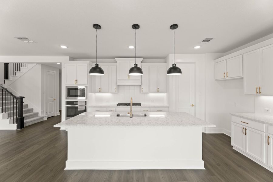 Representative furnished interior of a home built from the Laurel by Tri Pointe Homes in Treeline, Justin (Image 6).