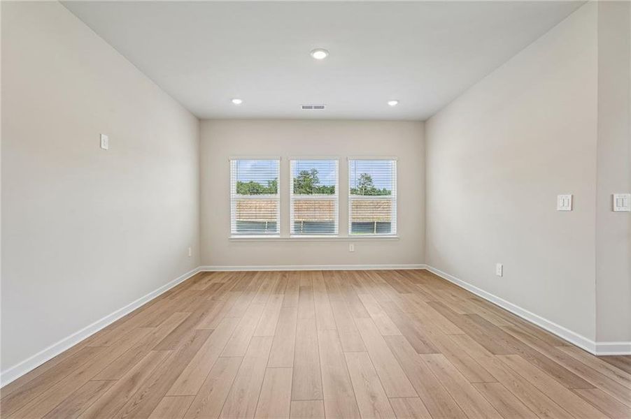 Spacious, unfurnished interior of a new home in Northwoods at Mirror Lake, Villa Rica (Image 49).