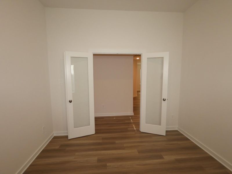 Spacious, unfurnished interior of a new home in Pinewood at Grand Texas, New Caney (Image 33).