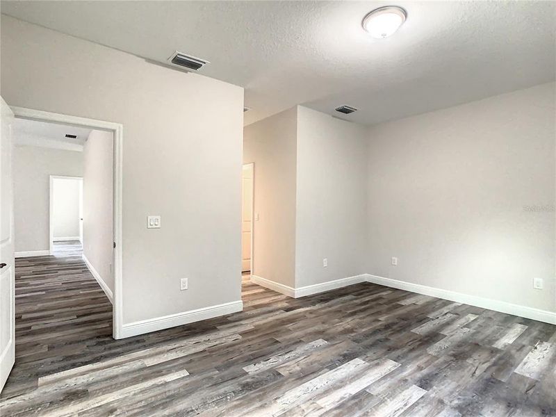 Spacious, unfurnished interior of a new home in , Port Charlotte (Image 17).