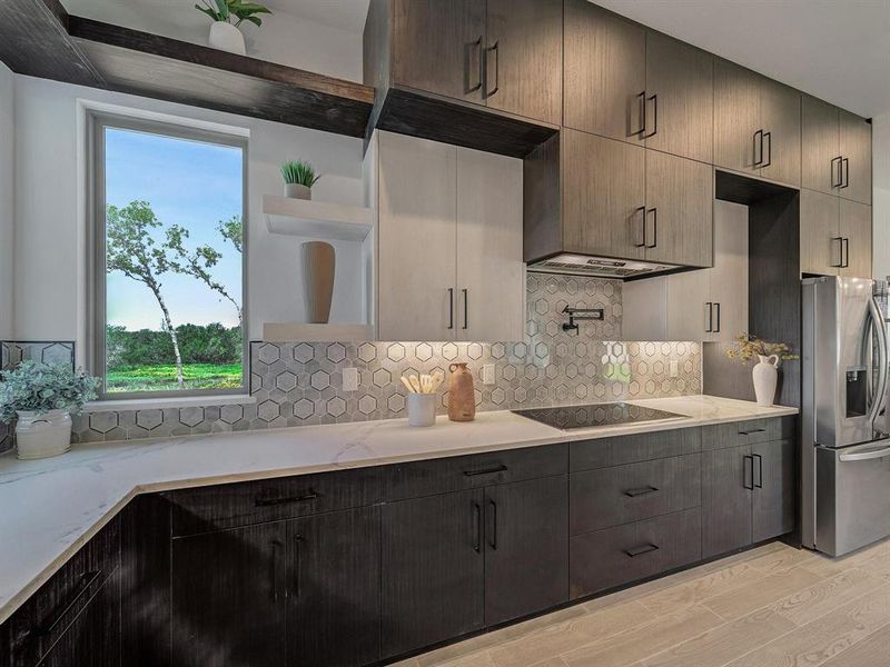 Kitchen featuring stainless steel fridge, open shelves, black electric cooktop, light wood finished floors, and light stone countertops