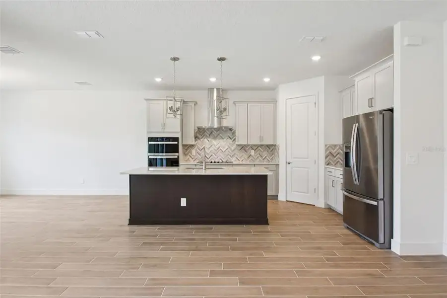 Furnished interior view inside a new home in Ridgehaven - Reserve Series, Ormond Beach (Image 5).