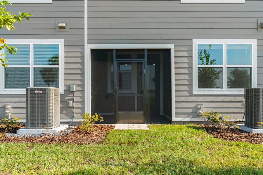 Exterior details and patio area of a home in Catamaran Cove, Rockledge (Image 4).