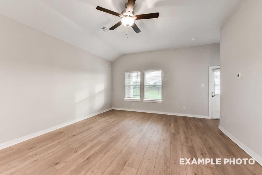 Spacious, unfurnished interior of a new home in Sunterra, Katy (Image 12).