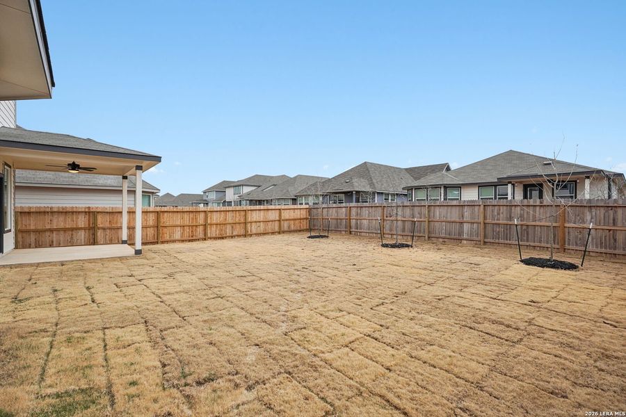 Exterior details and patio area of a home in Estancia Ranch - Classic Series, San Antonio (Image 29).