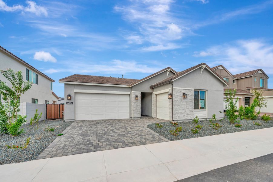 Front exterior of a new home in Soleo, San Tan Valley, AZ, highlighting curb appeal (Image 20).