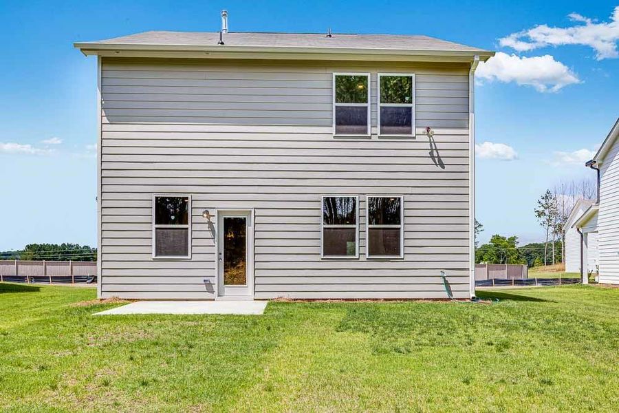 Exterior details and patio area of a home in Heritage River, Euharlee (Image 3).