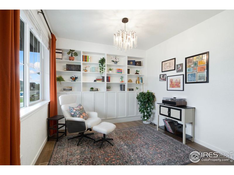 Main level study with built-in bookshelves - perfect as a home office, library, of flex space. Main level study with built-in bookshelves - perfect as a home office, library, of flex space.
