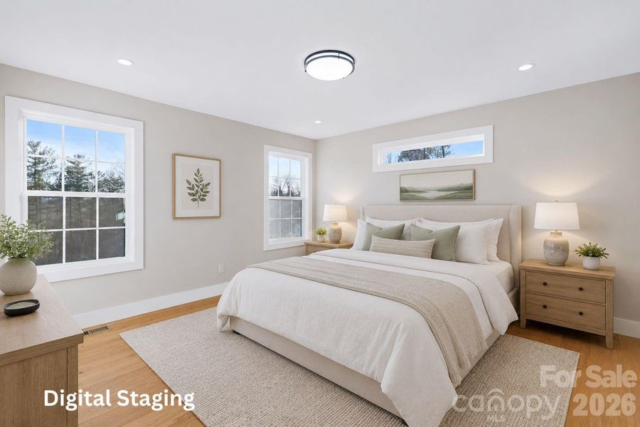 "The Laurel". Primary Suite on main level. Representative photo from Corner Rock Builders showing similar floorplan, craftsmanship, quality of construction and finish level. Digitally staged. "The Laurel". Primary Suite on main level. Representative photo from Corner Rock Builders showing similar floorplan, craftsmanship, quality of construction and finish level. Digitally staged.