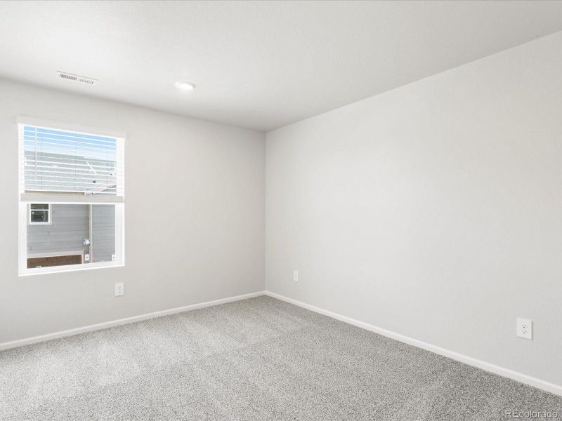 Spacious, unfurnished interior of a new home in Poudre Heights: The Meadow Collection, Windsor (Image 27).