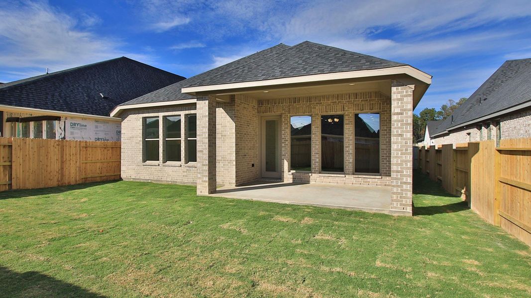 Exterior details and patio area of a home in Audubon, Magnolia (Image 3).