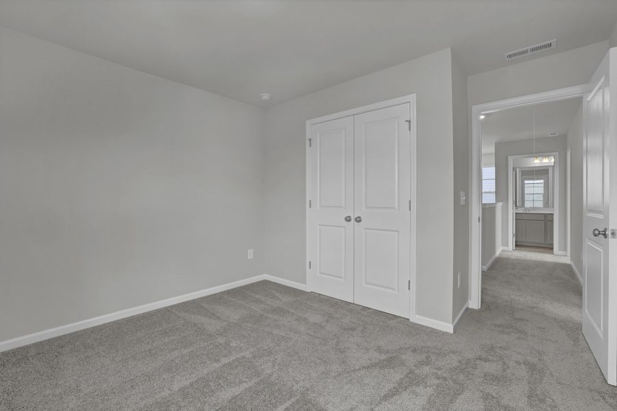 Spacious, unfurnished interior of a new home in River Tide Farms, Bolivia (Image 22).