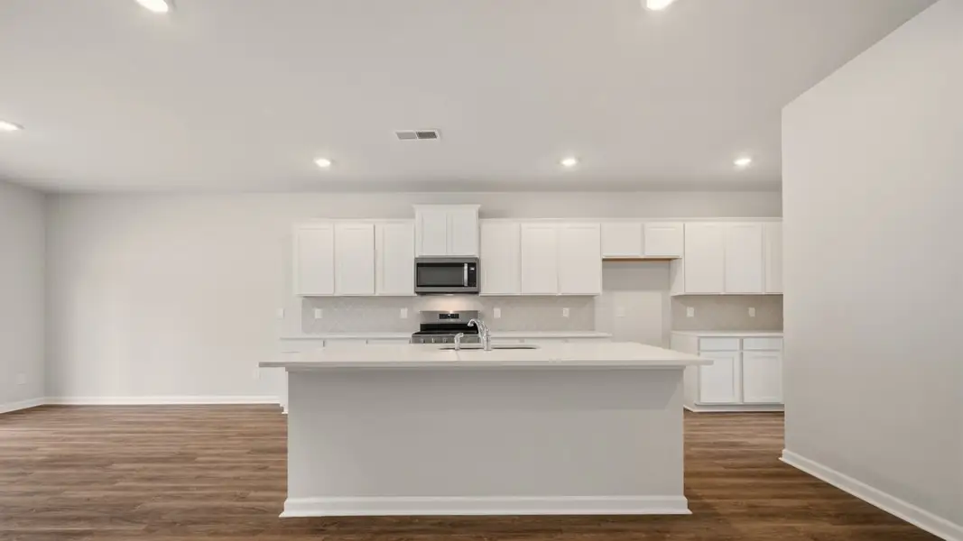 Furnished interior view inside a new home in Brooks Station, Dacula (Image 4).