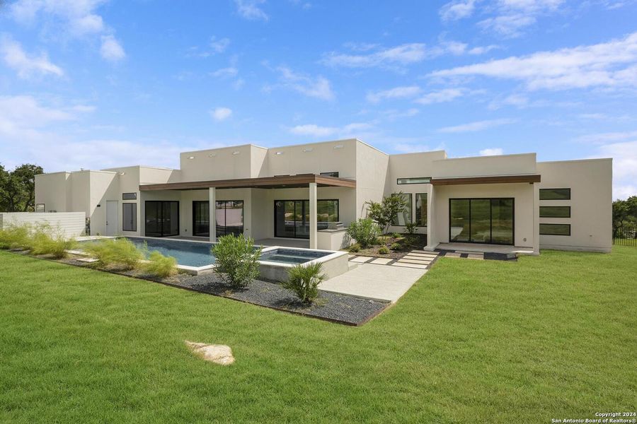 Front exterior of a new home in , San Antonio, TX, highlighting curb appeal (Image 26).