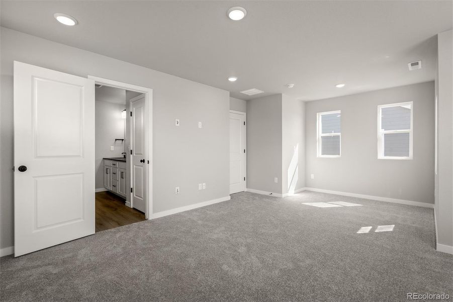 Spacious, unfurnished interior of a new home in Revel Crossing at Wolf Ranch – The Ascent Collection, Colorado Springs (Image 15).