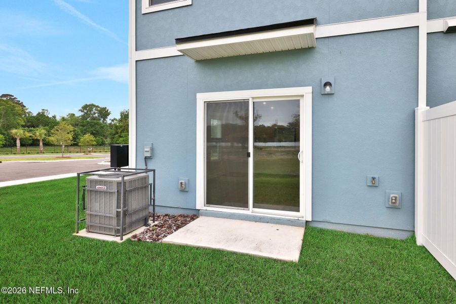 Exterior details and patio area of a home in Kasen Oaks, Jacksonville (Image 25).